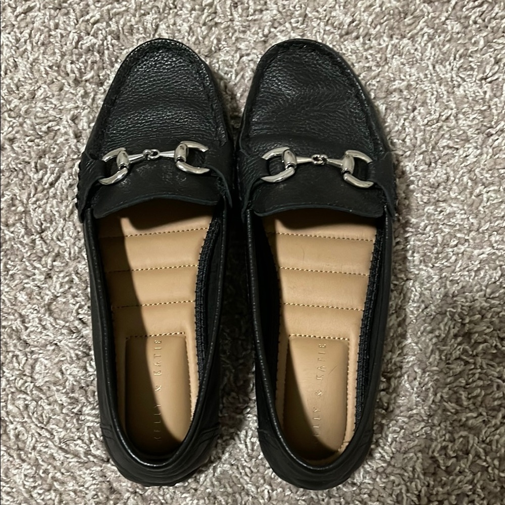 Black Leather Loafers with Silver Accents
